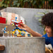 LEGO® TALLER Y AVIÓN TORNADO DE TAILS (76991)