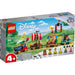 Set LEGO Disney Tren Homenaje a Disney 43212 con locomotora, tres vagones y personajes de Disney como Mickey, Minnie y Woody.