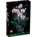 Modelo LEGO Orchid 10311 con flores blancas y rosas en jarrón azul decorativo